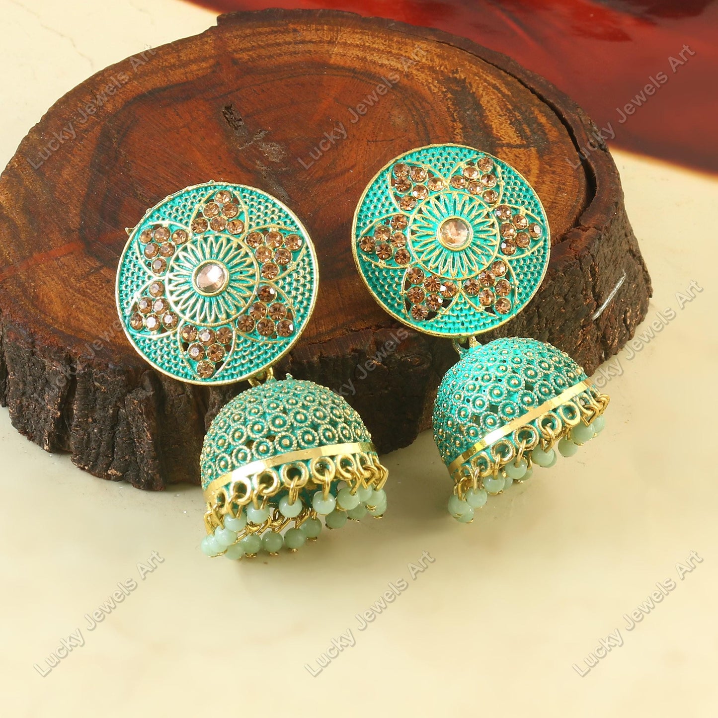 Classic Light Green Jhumka with Gold Accents